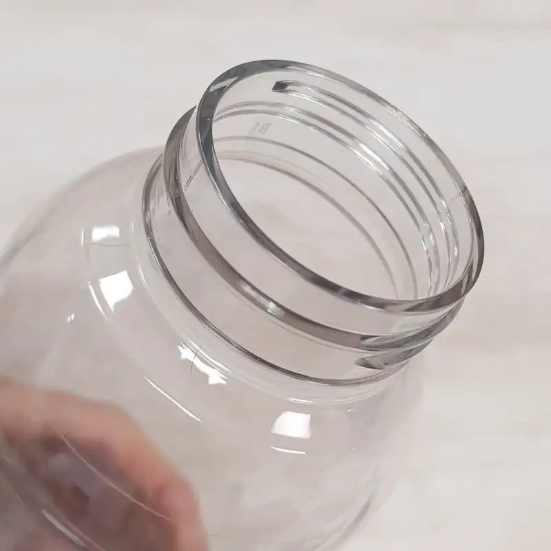 Botella plástica transparente de 600 ml con tapa a rosca para personalizar con logo (4)